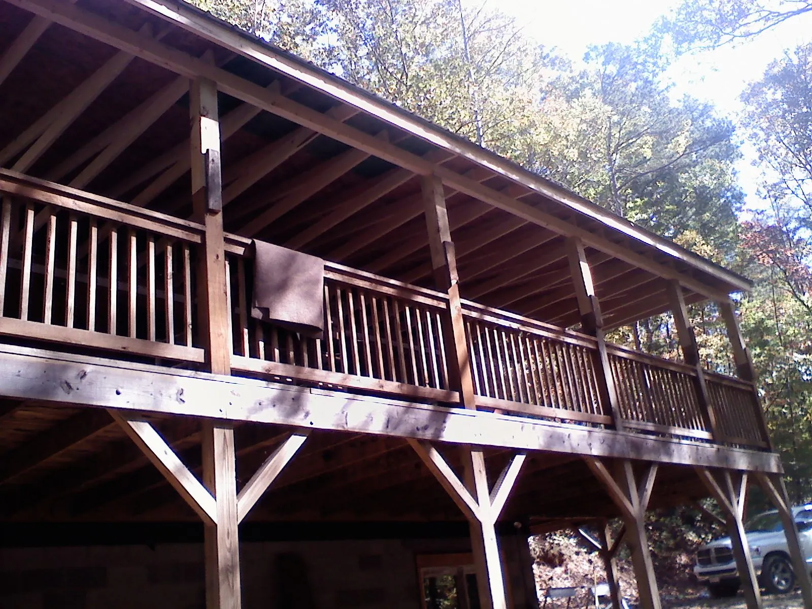 Timber framing under a new elevated porch and deck — Roof Leak Repair in Sheridan by Roofing Brothers